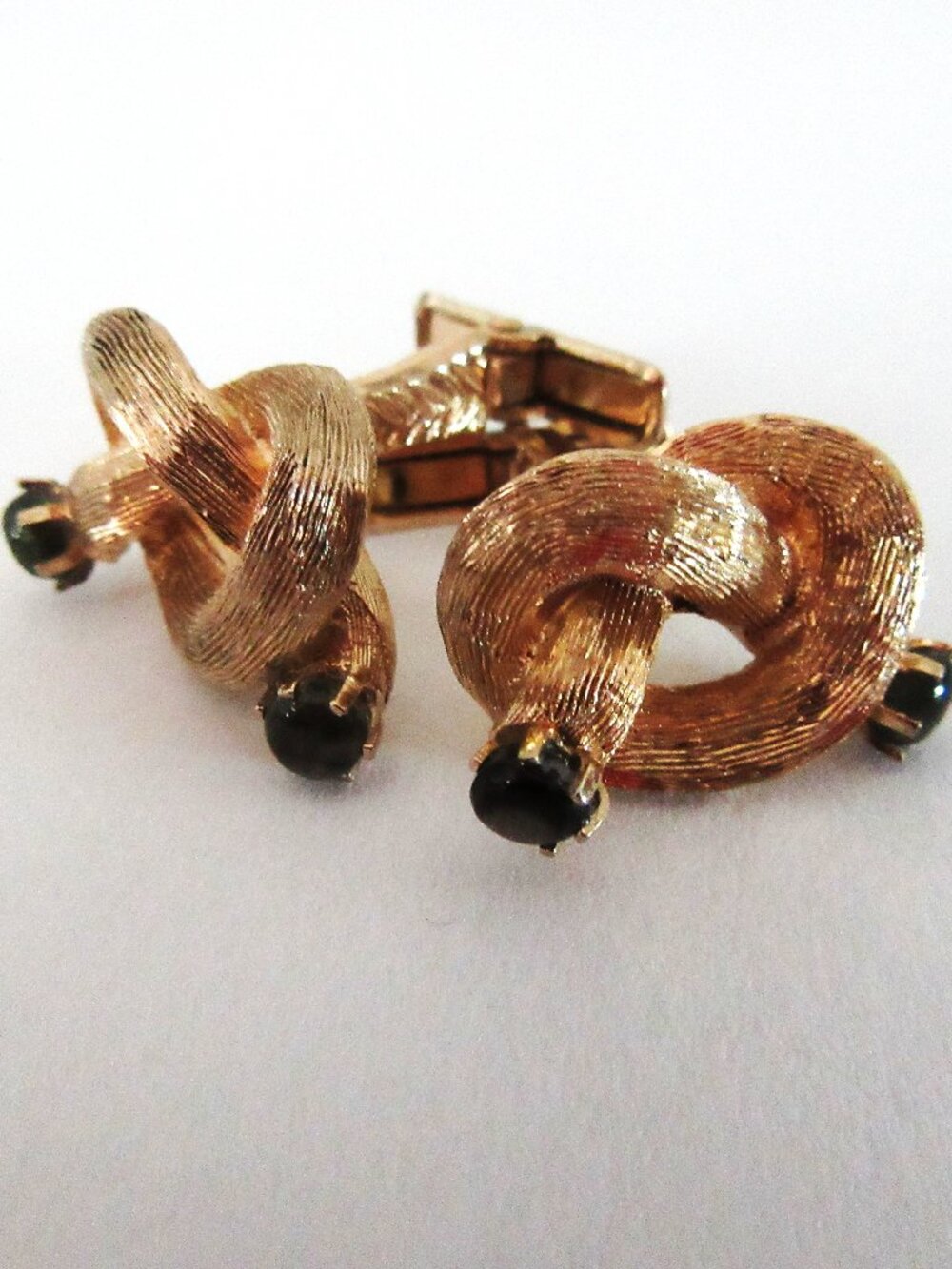 Gold tone & faux onyx etched knot unisex cufflinks